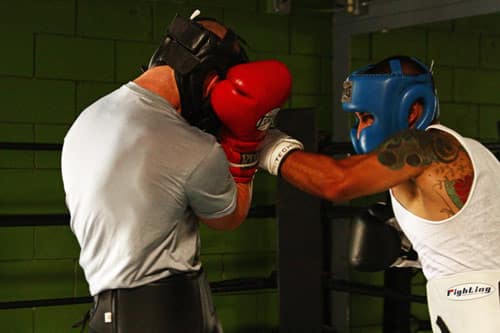 How to Hold Focus Pads for a Left Hook (10 of 32), Boxing