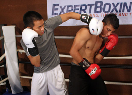 Angled left hook against southpaw